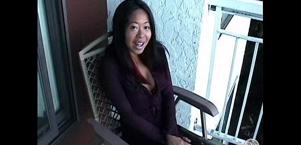  Asian Mame flashing huge boobs on a balcony in Canada